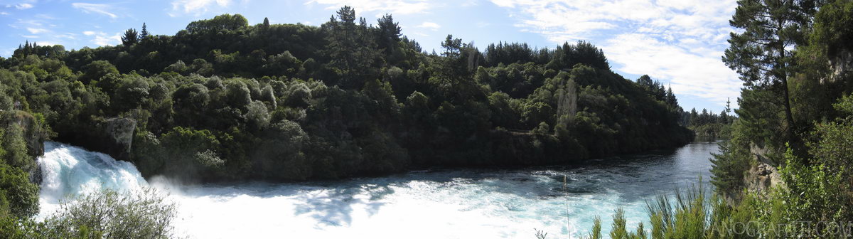 Huka Falls on the Waikato River - Flowing at 220,000 liters per second, the Waikato River squeezes through a 15 meter wide 8 meter high waterfall on its way to Lake Taupo