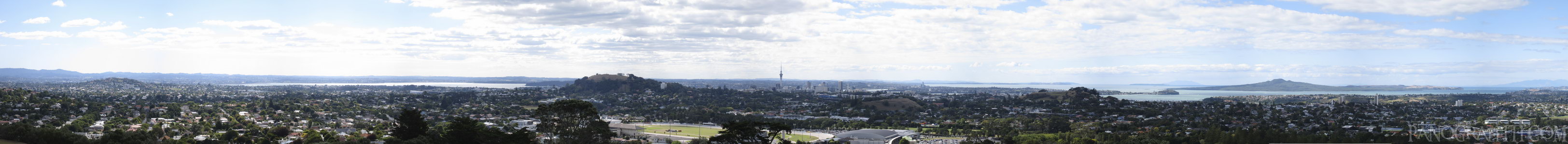 Sky Tower from One Tree Hill - The iconic Sky Tower in the center of the Auckland skyline as seen from the peak of One Tree Hill