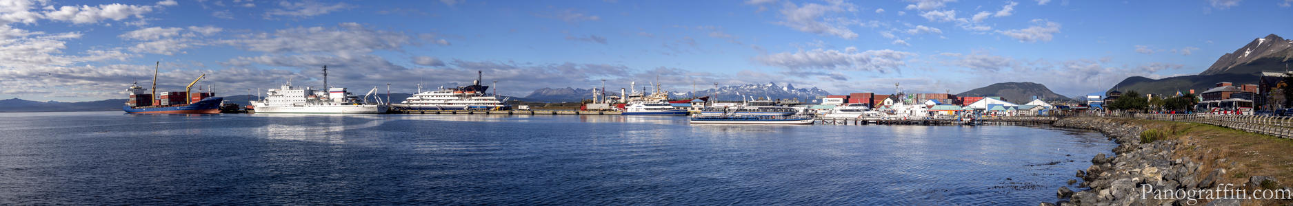 Sunshine Highlighting the Akademik Ioffe - Ushuaia harbor and wharf just a few hours before departing aboard the Russian ship named the Ioffe for a 12 day cruise to Antarctica at the end of March